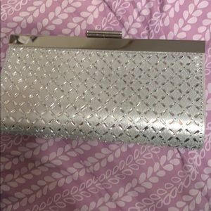 A classy clutch with over the shoulder chain